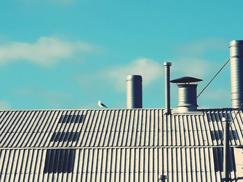 Low angle view of roof against sky