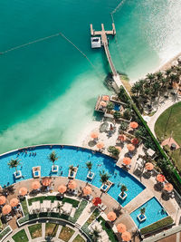 High angle view of swimming pool by building