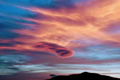 Low angle view of dramatic sky during sunset