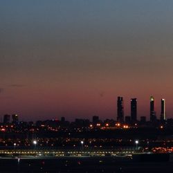 Illuminated cityscape at night