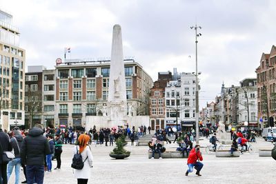 People walking on street in city