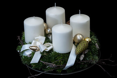 High angle view of candles on black background