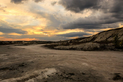 Scenic view of landscape against sky during sunset