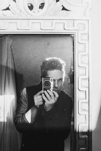 Man photographing with mobile phone