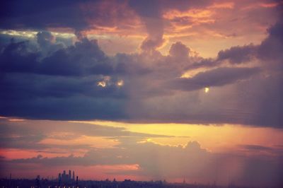 Scenic view of cloudy sky at sunset