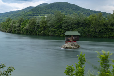 Scenic view of lake by mountain