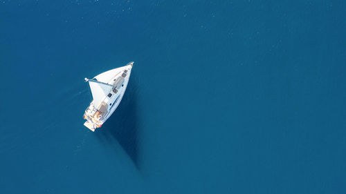 High angle view of sailboat in sea