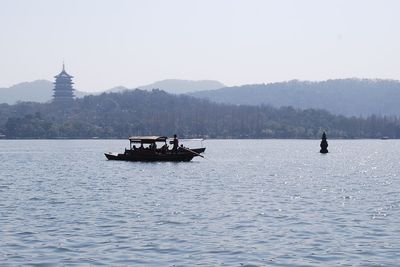 Boats sailing in sea