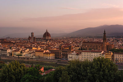 High angle view of townscape against sky during sunset