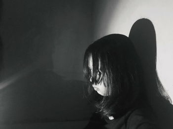 Portrait of woman looking at home