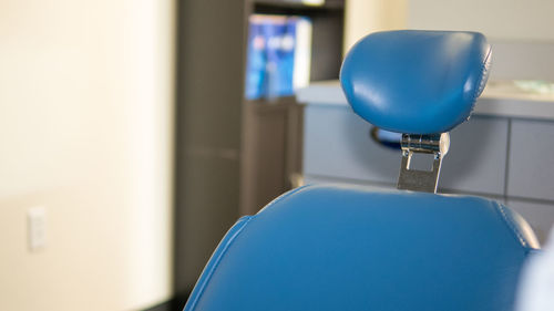 Close-up of dentist chair in hospital