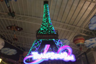 Low angle view of illuminated christmas tree at night