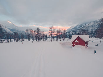 Scenic view of snowcapped mountain against sky during winter