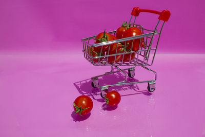 Close-up of cherries against blue background