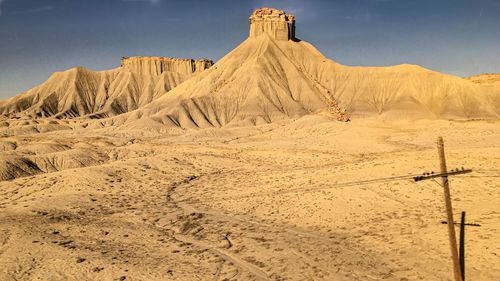 Scenic view of desert against sky