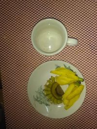 High angle view of fruit in plate on table