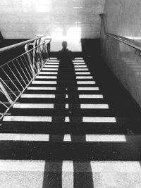 Shadow of person on staircase