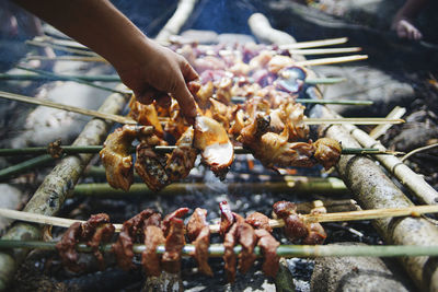 Close-up of meat on barbecue grill