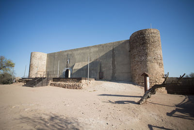 Historic building against clear blue sky at castro marim