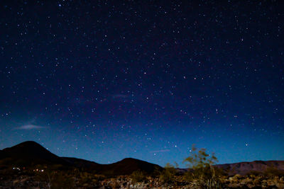 Scenic view of star field against sky at night