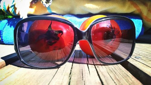 Close-up of sunglasses on table