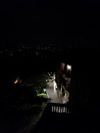 High angle view of illuminated buildings in city at night