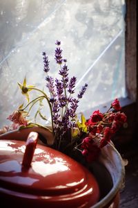 Close-up of flower vase on table