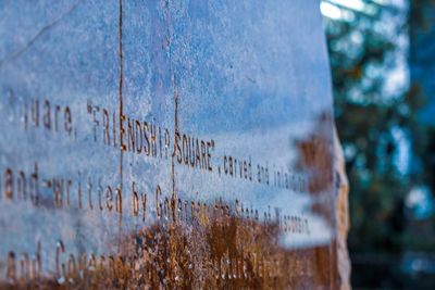 Close-up of text on cemetery