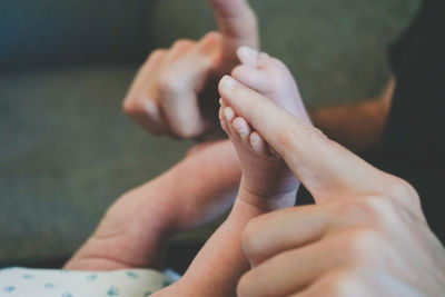 Close-up of woman holding hands