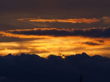 Scenic view of dramatic sky during sunset