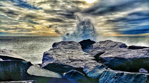 Panoramic view of sea against sky during sunset