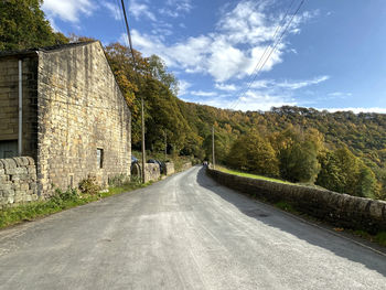 View along, midgehole road, on a sunny autumn day in, hebden bridge, yorkshire, uk