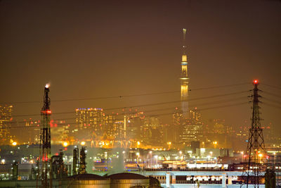 Illuminated buildings in city at night