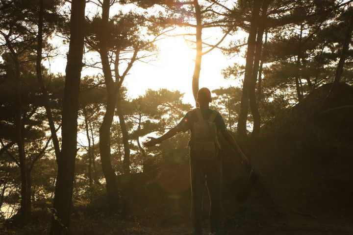 PEOPLE STANDING IN FOREST