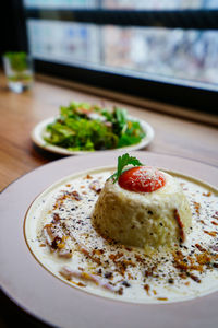 Close-up of food in plate on table