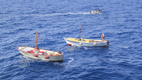 High angle view of sailboat in sea