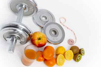 High angle view of fruits and white background