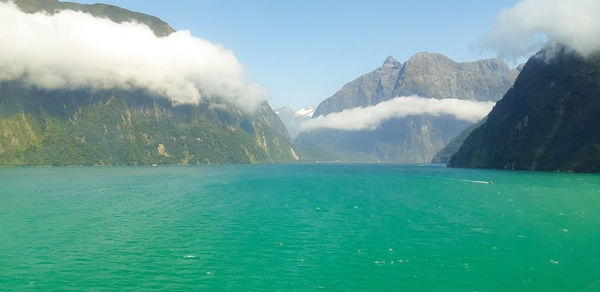 Scenic view of sea against cloudy sky