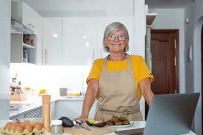 Portrait of young man working at home