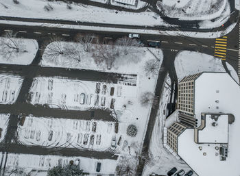 High angle view of snow covered cars