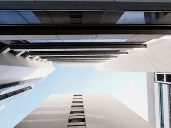 Low angle view of modern buildings against clear sky