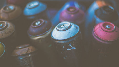 Full frame shot of old spray bottles