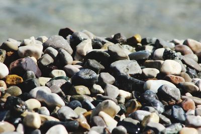 Close-up of stones on beach