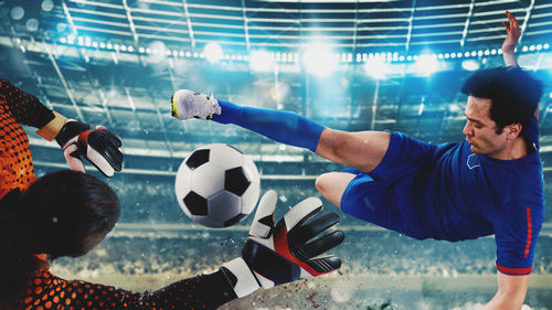 Boy playing soccer ball