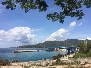 Scenic view of sea against cloudy sky