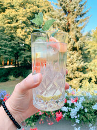 Close-up of hand holding drink