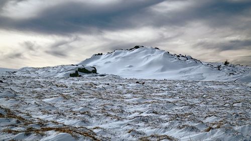 Scenic view of snowcapped mountain against sky