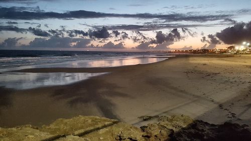 Scenic view of landscape against sky during sunset