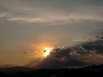 Low angle view of silhouette mountain against sky during sunset