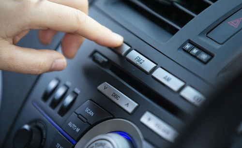 Hand holding a radio car